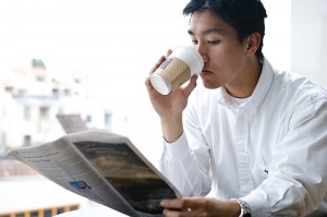 man-reading-newspaper