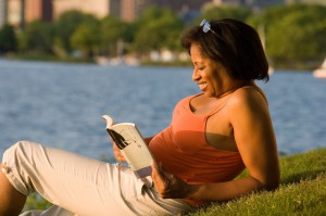woman-reading-by-lake