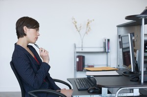 woman-thinking-at-desk